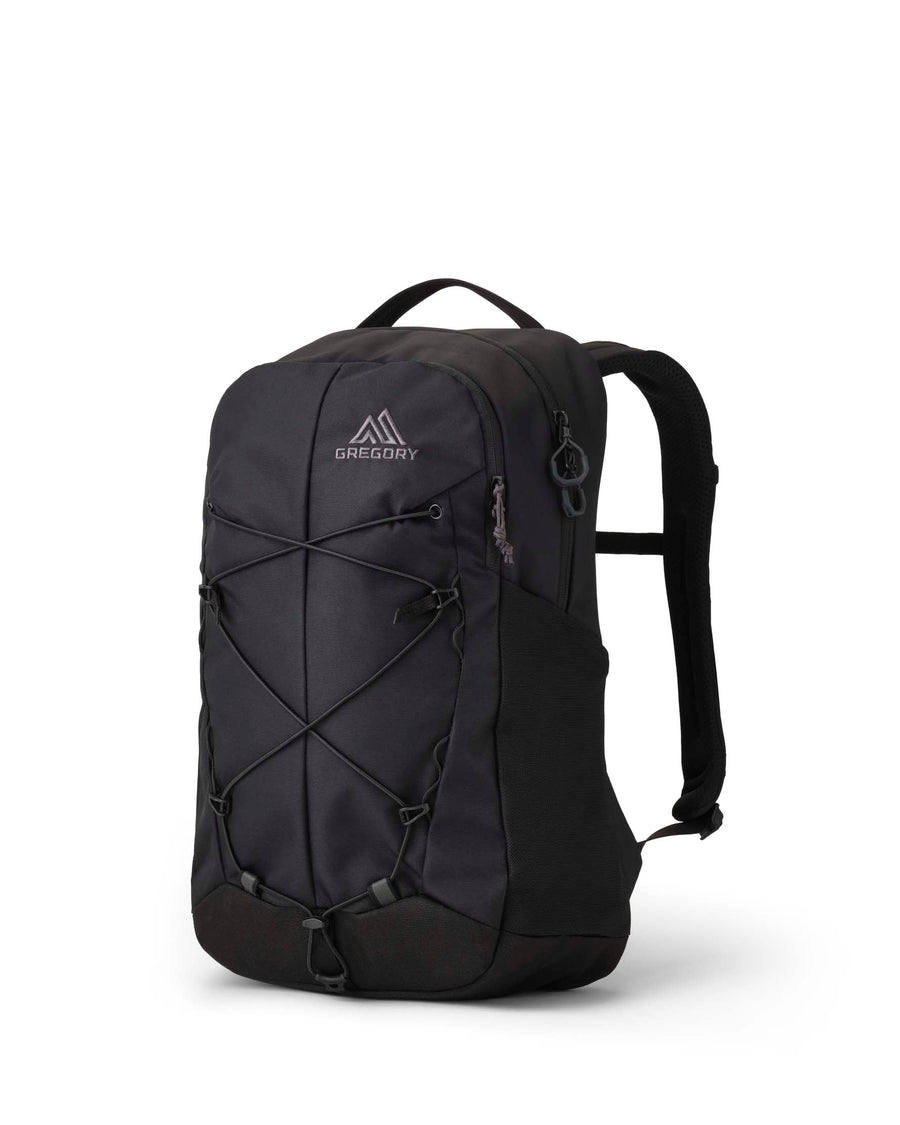A black Gregory backpack with a front zippered pocket and crisscross compression straps, shown on a clean white background.