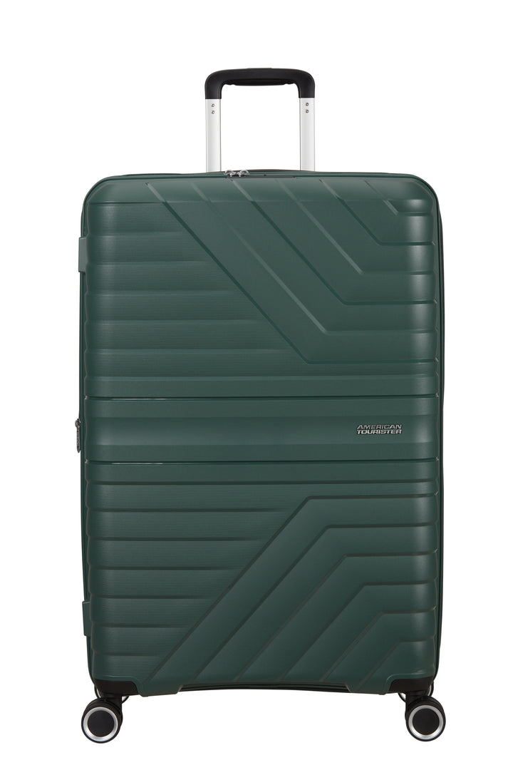 A dark green hard-shell spinner suitcase with a geometric chevron pattern, featuring an extended telescopic handle and four multi-directional wheels, shown against a plain white background.