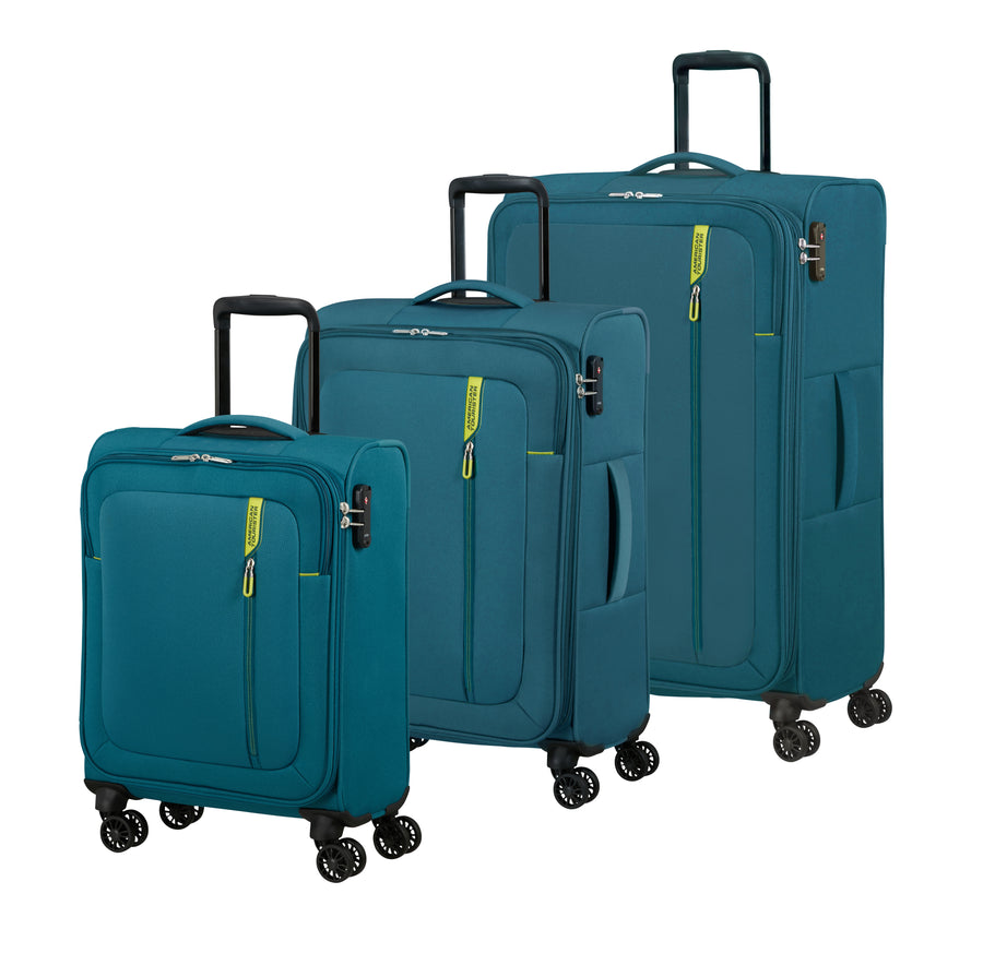 Set of three teal American Tourister suitcases of different sizes on a white background