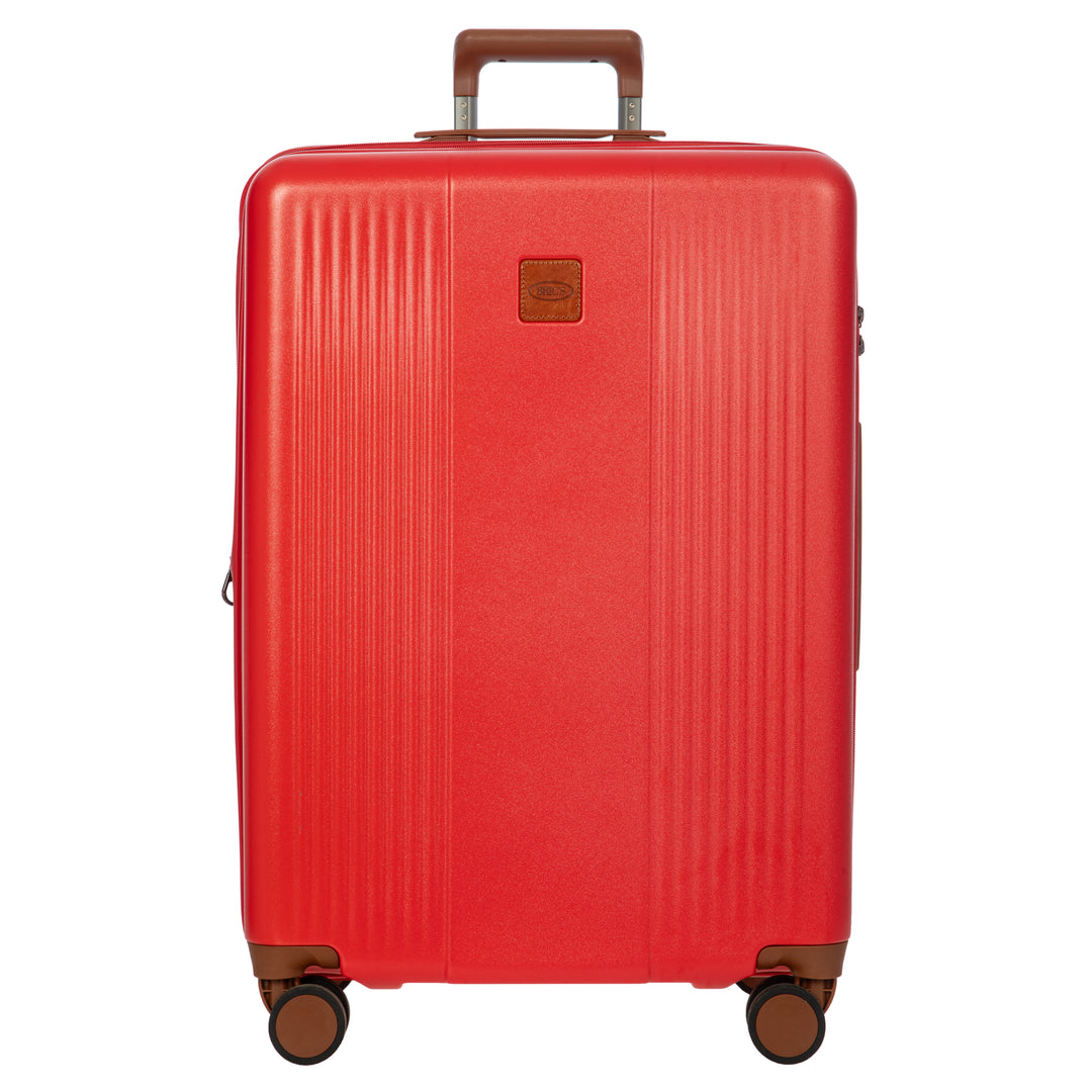 Red Bric's suitcase with brown handle and wheels on a white background