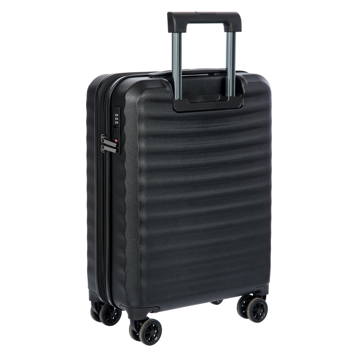 Back of a Black Bric's cabin case with a ribbed texture on a white background