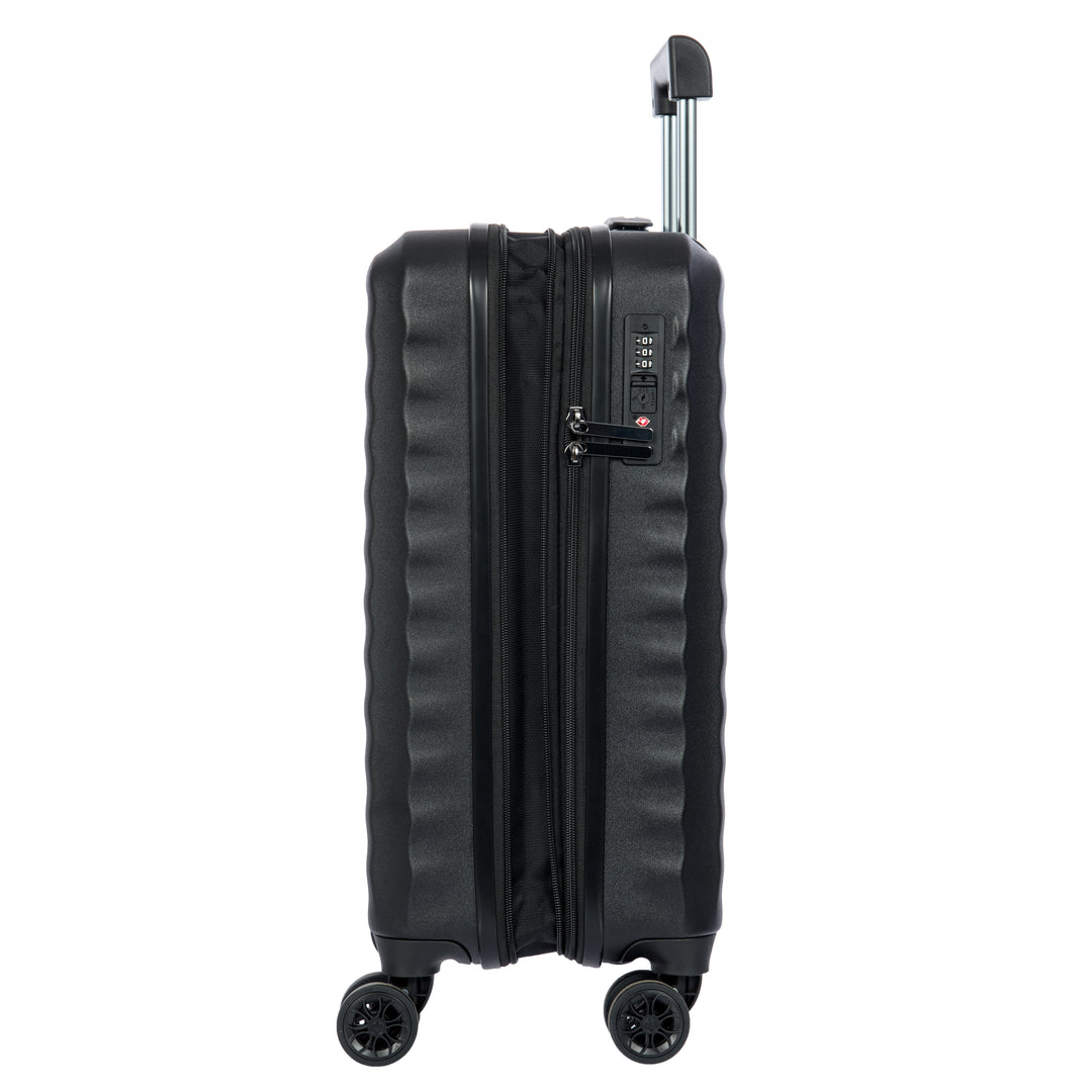 Side angle of a Black Bric's cabin case with a ribbed texture on a white background