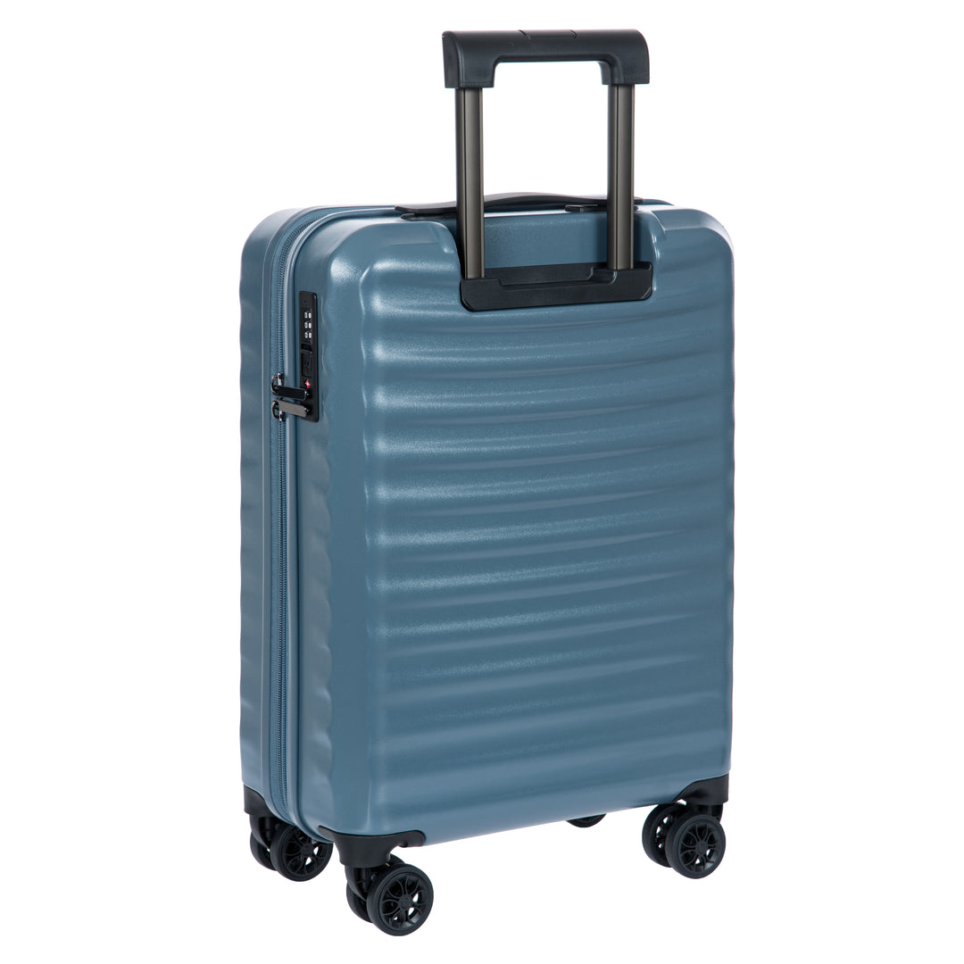 Back of a Blue Bric's cabin suitcase with a textured surface on a white background