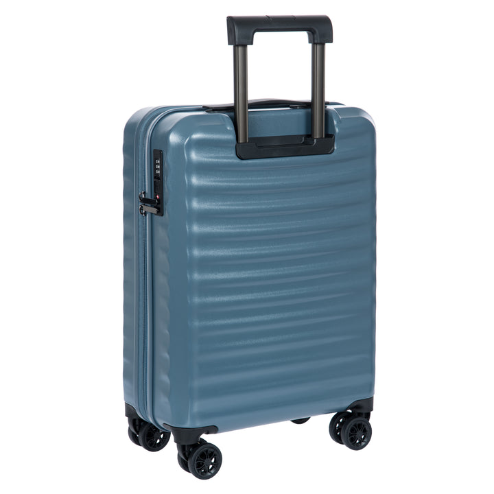 Back of a Blue Bric's cabin suitcase with a textured surface on a white background