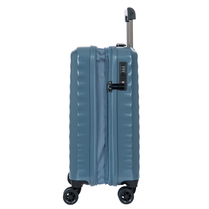 Side angle of a Blue Bric's cabin suitcase with a textured surface on a white background