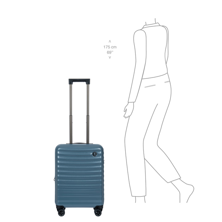 Blue suitcase next to a line drawing of a person for scale on a white background