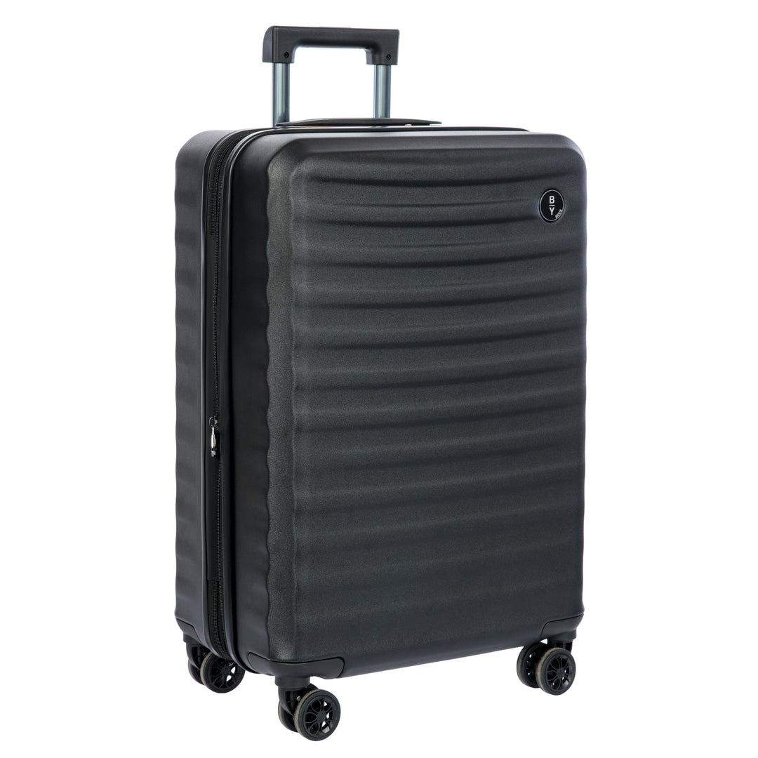Black Bric's suitcase with a textured surface on a white background