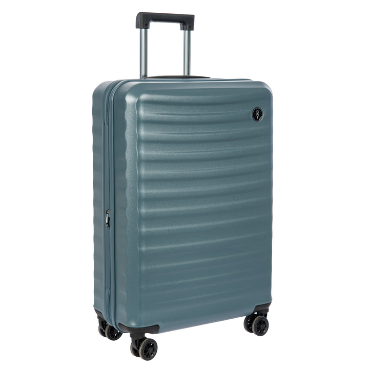 Blue Bric's suitcase with a ribbed texture on a white background