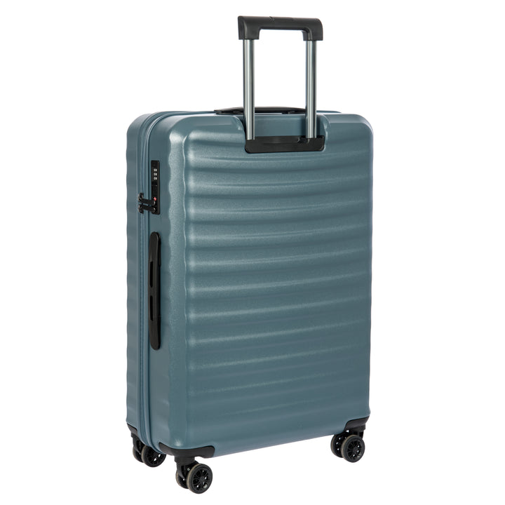 Back of a Blue Bric's suitcase with a ribbed texture on a white background