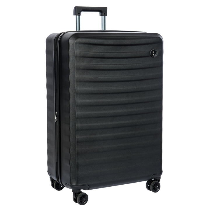 Black Bric's suitcase with a textured surface on a white background
