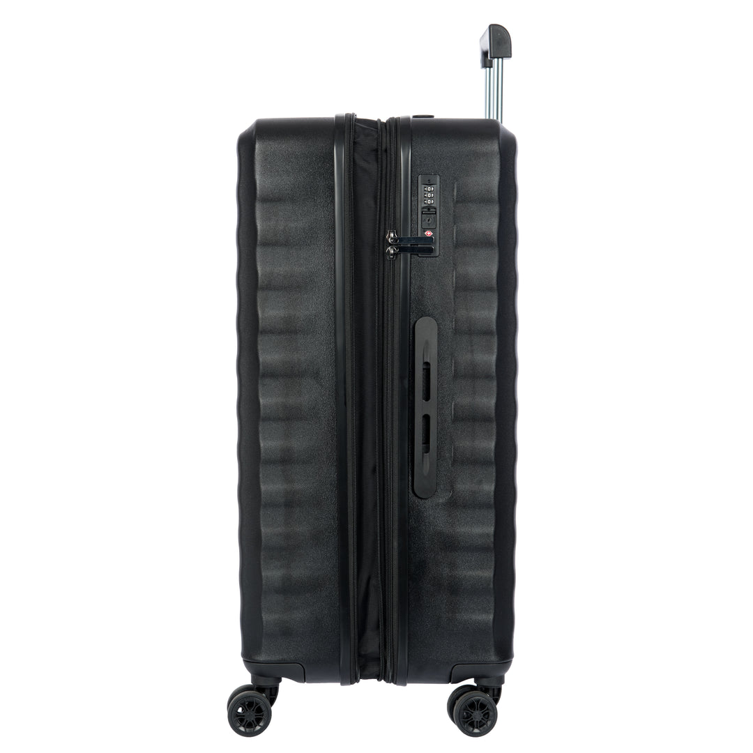Side angle of a Black Bric's suitcase with a textured surface on a white background