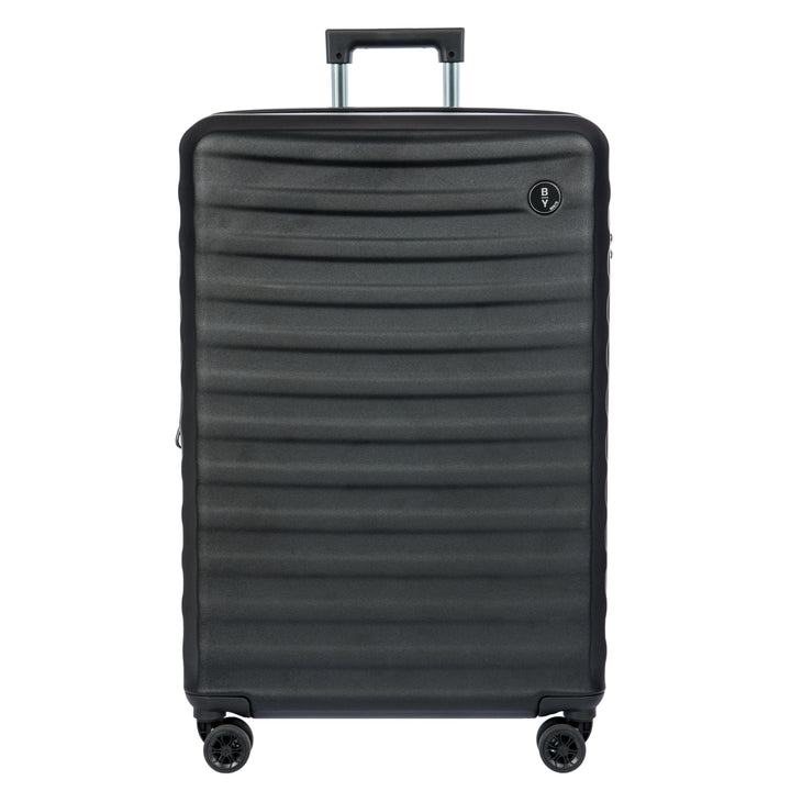 Black Bric's suitcase with a textured surface on a white background