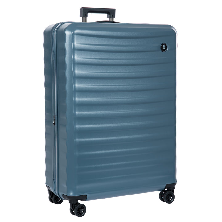 Blue Bric's suitcase with a textured surface on a white background