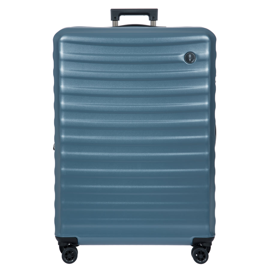 Blue Bric's suitcase with a ribbed texture on a white background