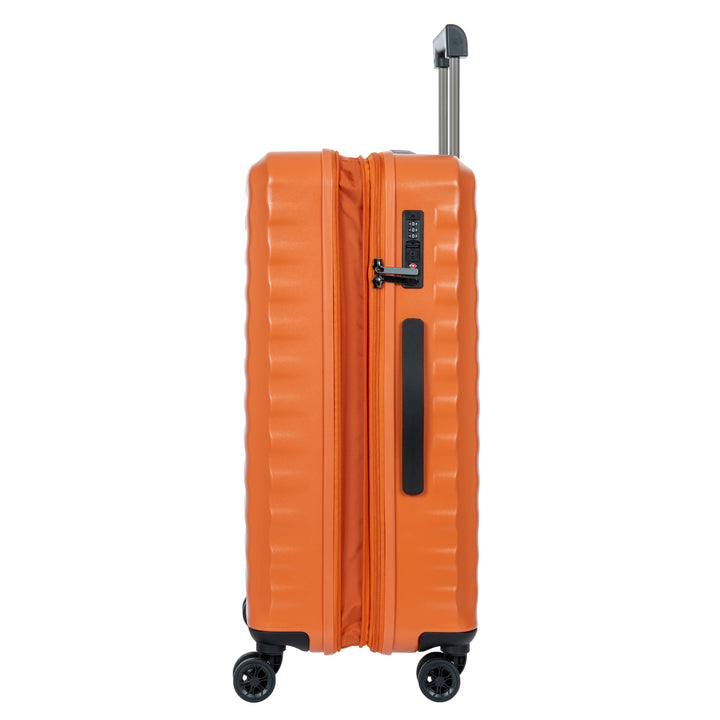 Side angle of an orange Bric's suitcase with a textured surface on a white background