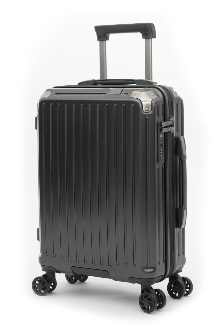 A black hard-shell spinner suitcase with a ribbed front panel, telescoping handle, and four wheels, shown on a clean white background.