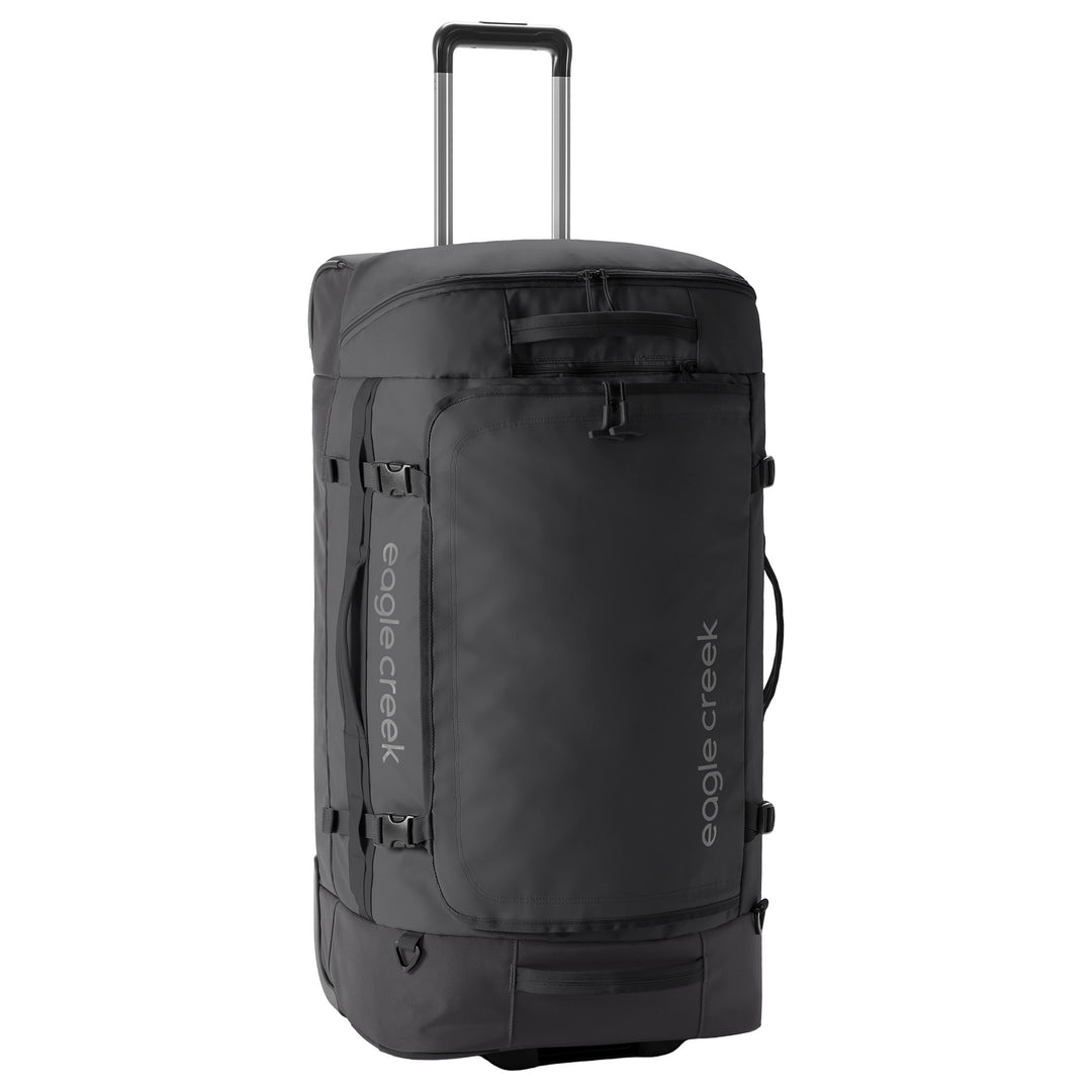 Black rolling duffel bag with 'eagle creek' branding on a white background