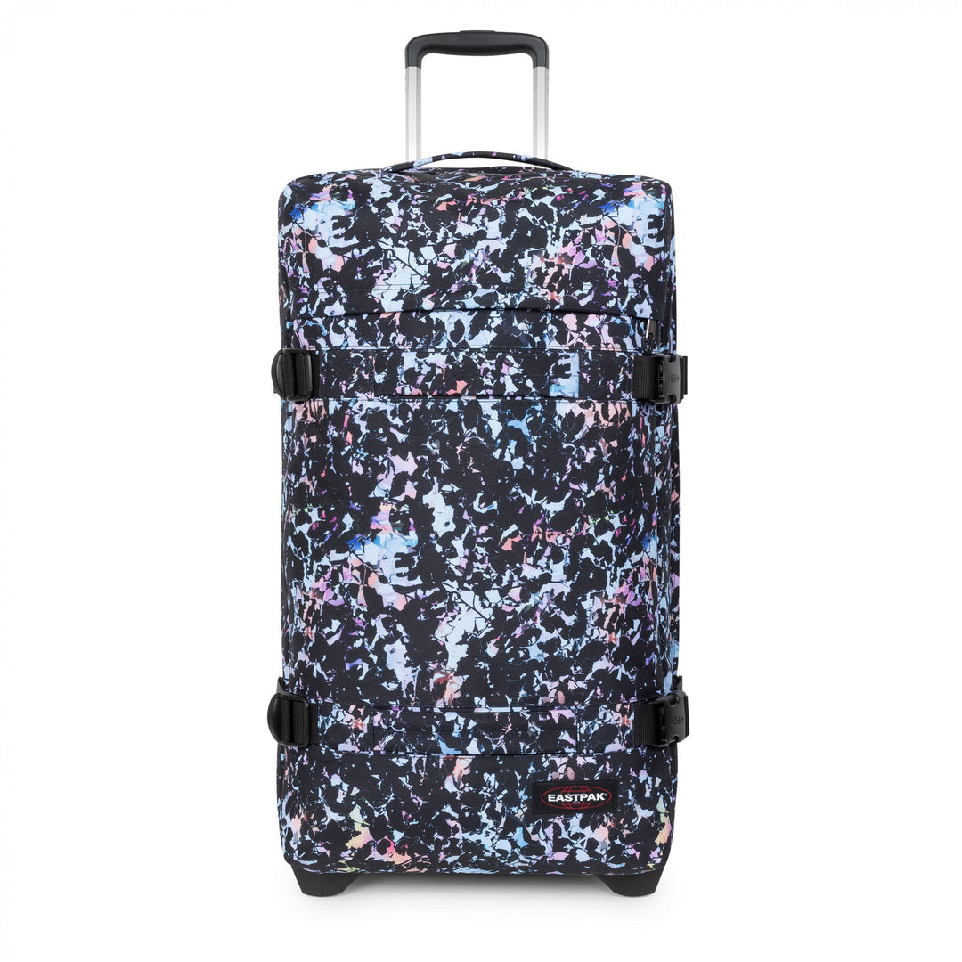 Multicolored patterned suitcase with Eastpak branding on a white background