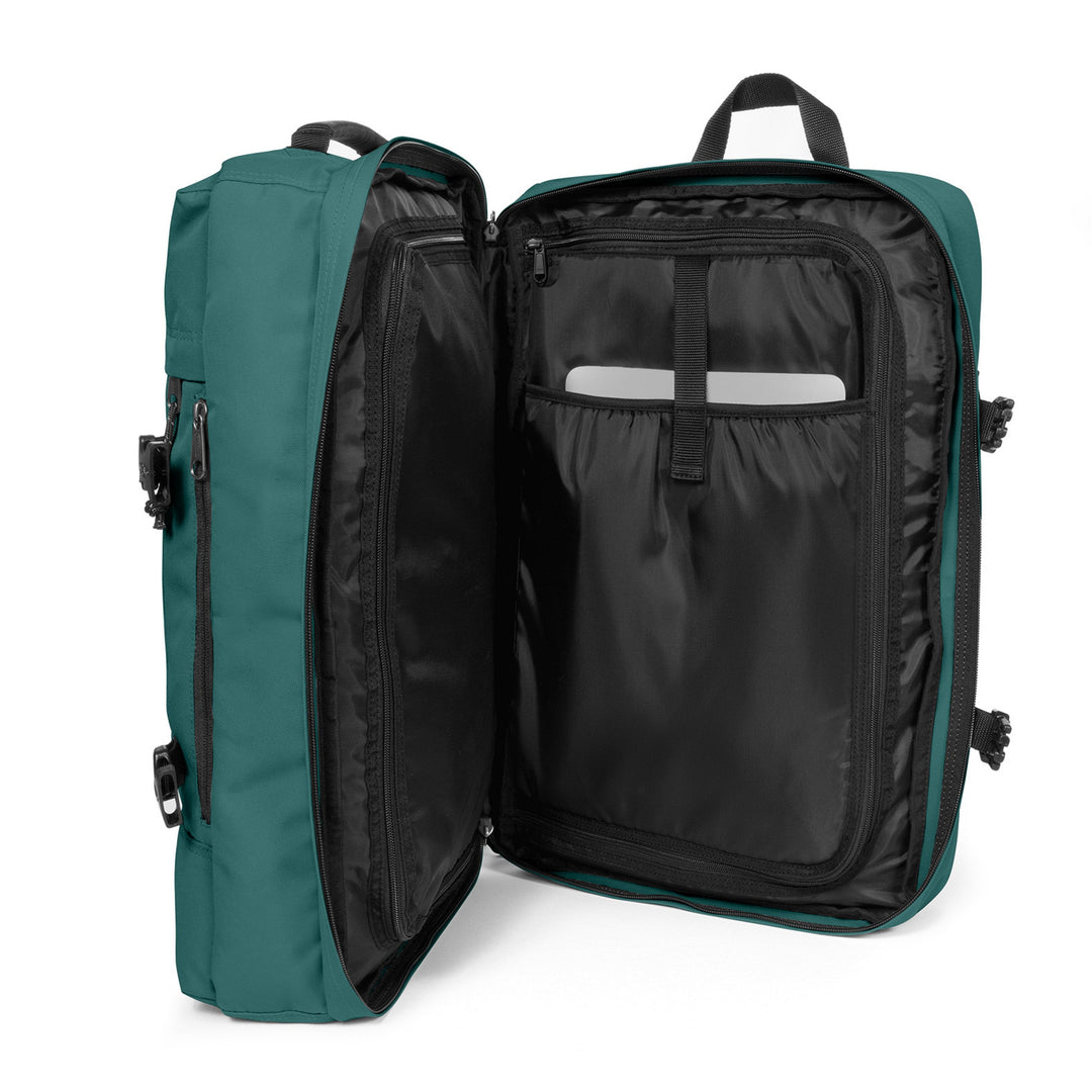 Green and black backpack with open compartments on a white background