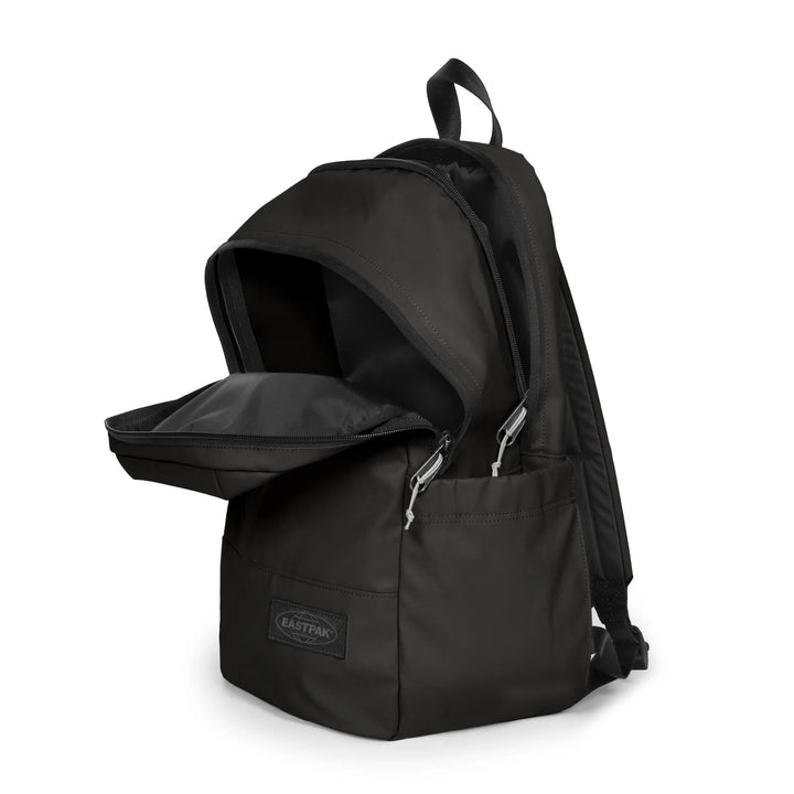 A black backpack shown from a three-quarter angle with its front zippered pocket open, revealing the interior. The brand name 'EASTPAK' is visible on a small black label on the lower front pocket.