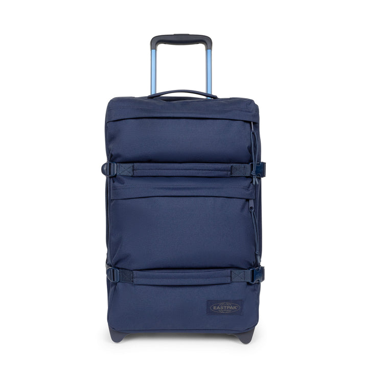 Blue suitcase with wheels on a white background