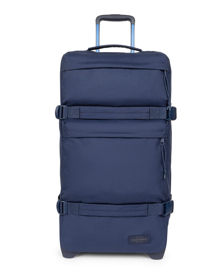 Blue rolling suitcase on a white background