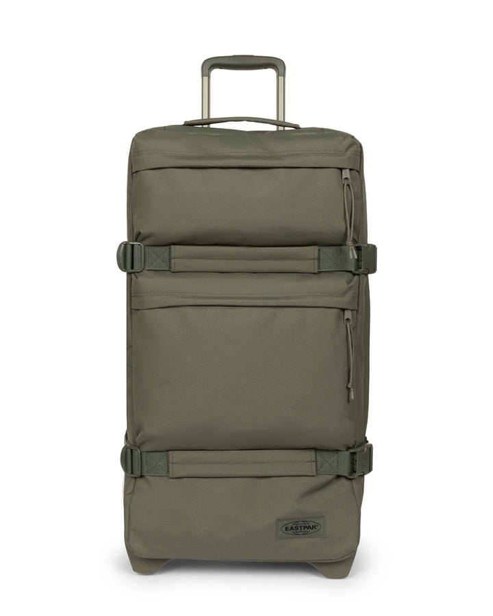 Green travel suitcase with wheels on a white background