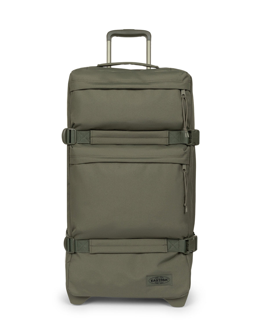 Green travel suitcase with wheels on a white background