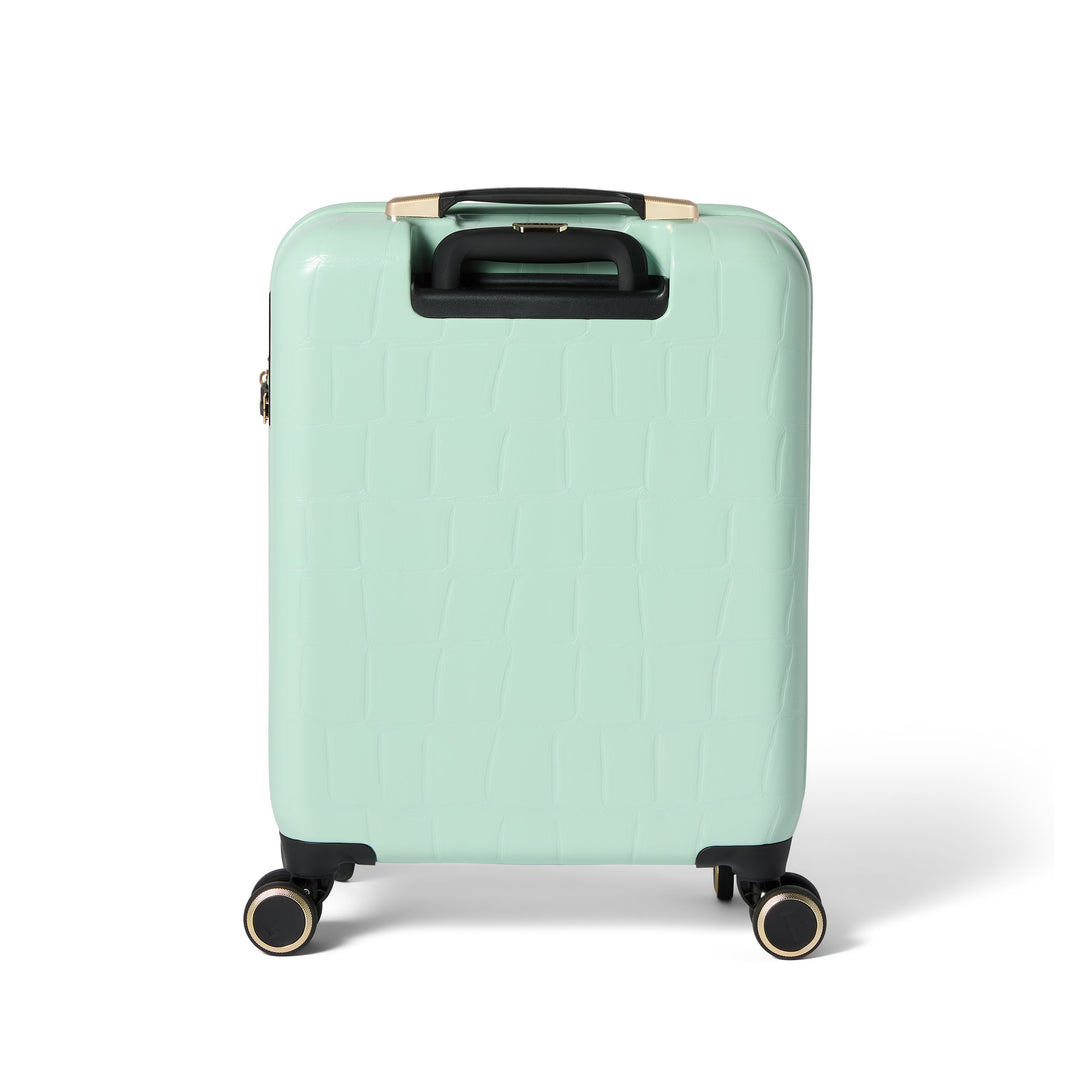 Mint green suitcase with a textured surface on a white background