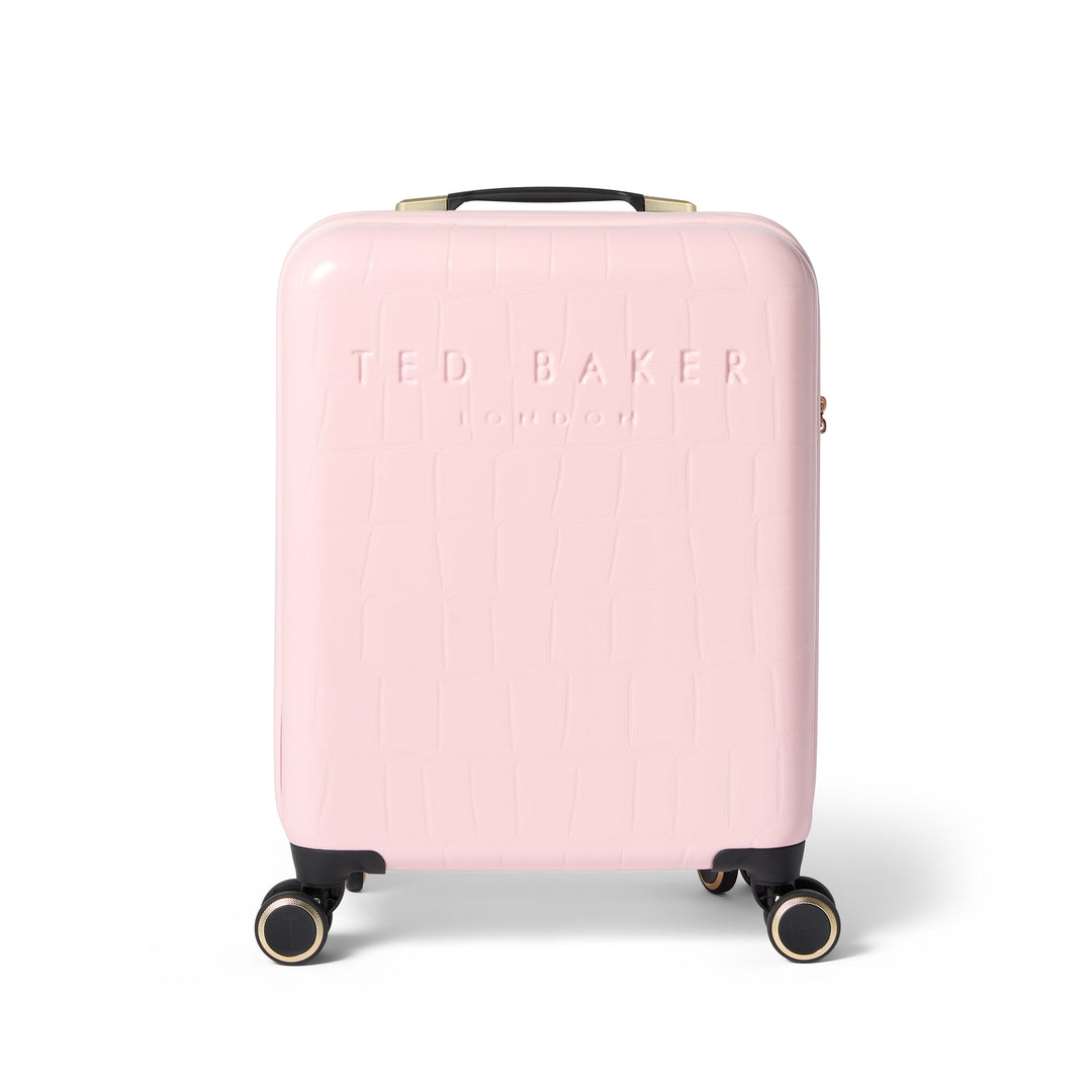 Pink suitcase with 'Ted Baker' branding on a white background
