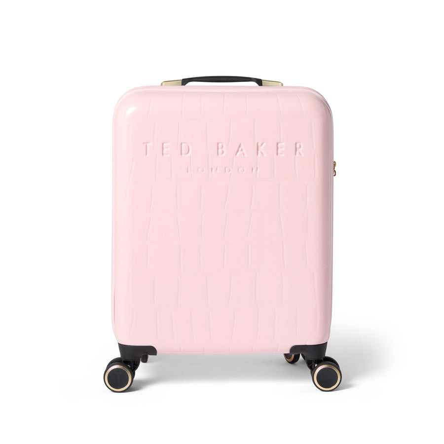 Pink suitcase with 'Ted Baker' branding on a white background