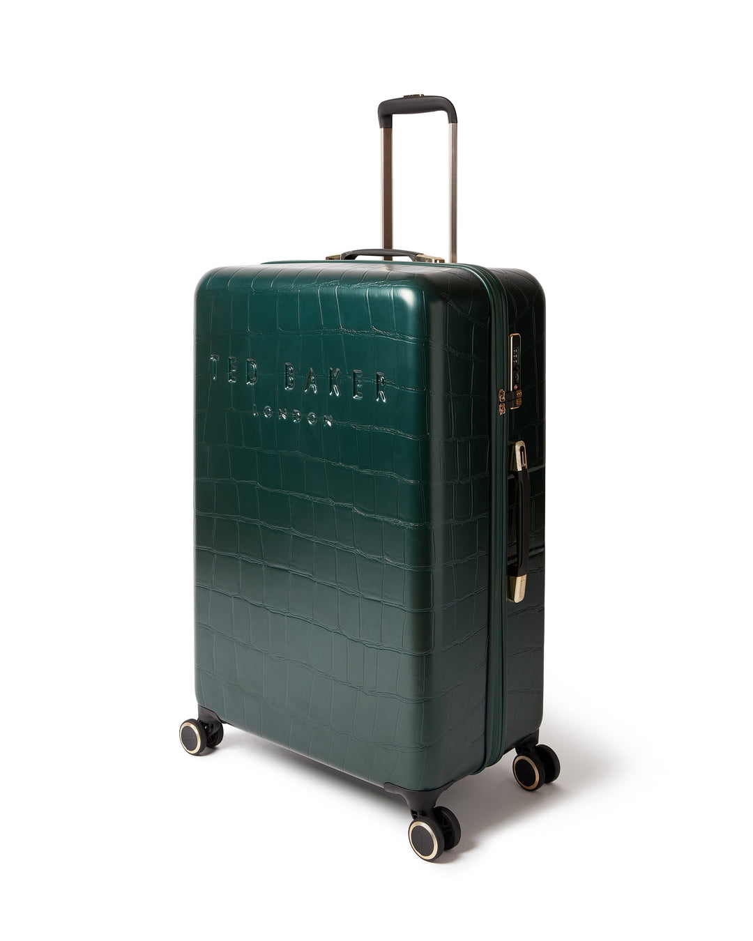 Green crocodile textured suitcase with Ted Baker London branding and gold accents on a white background