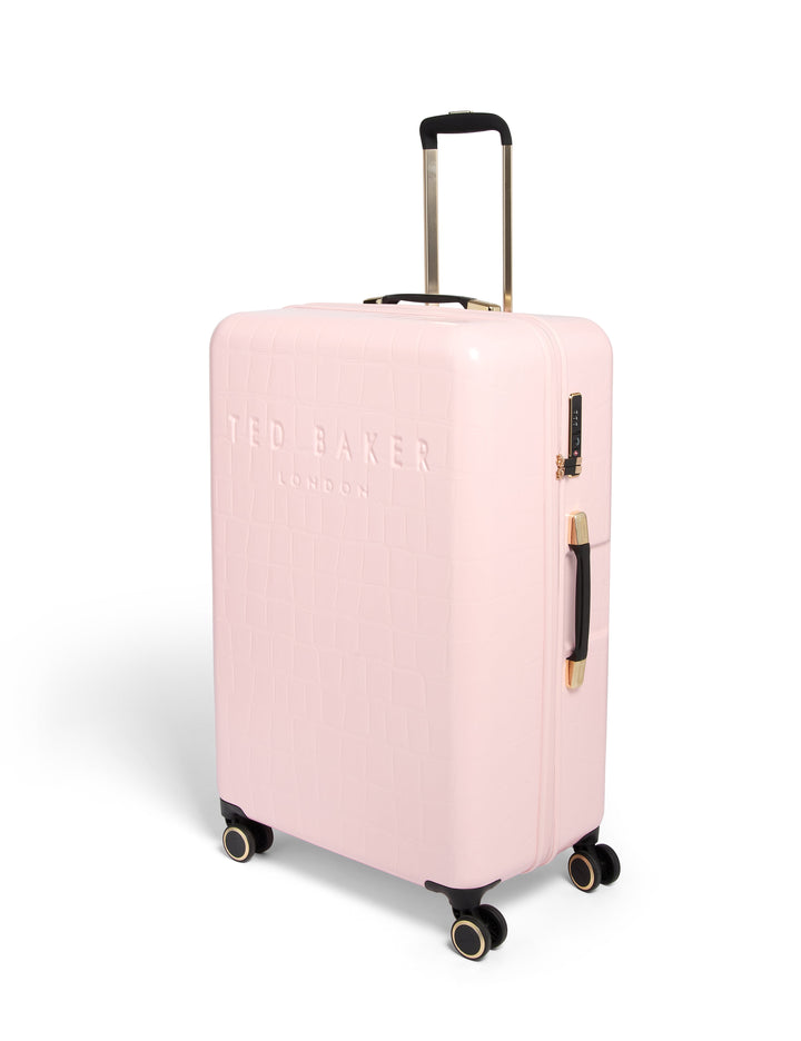 Pink suitcase with 'Ted Baker' branding on a white background