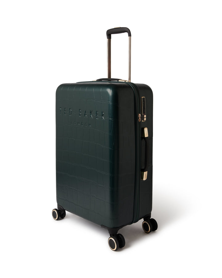 green suitcase with gold accents on a white background