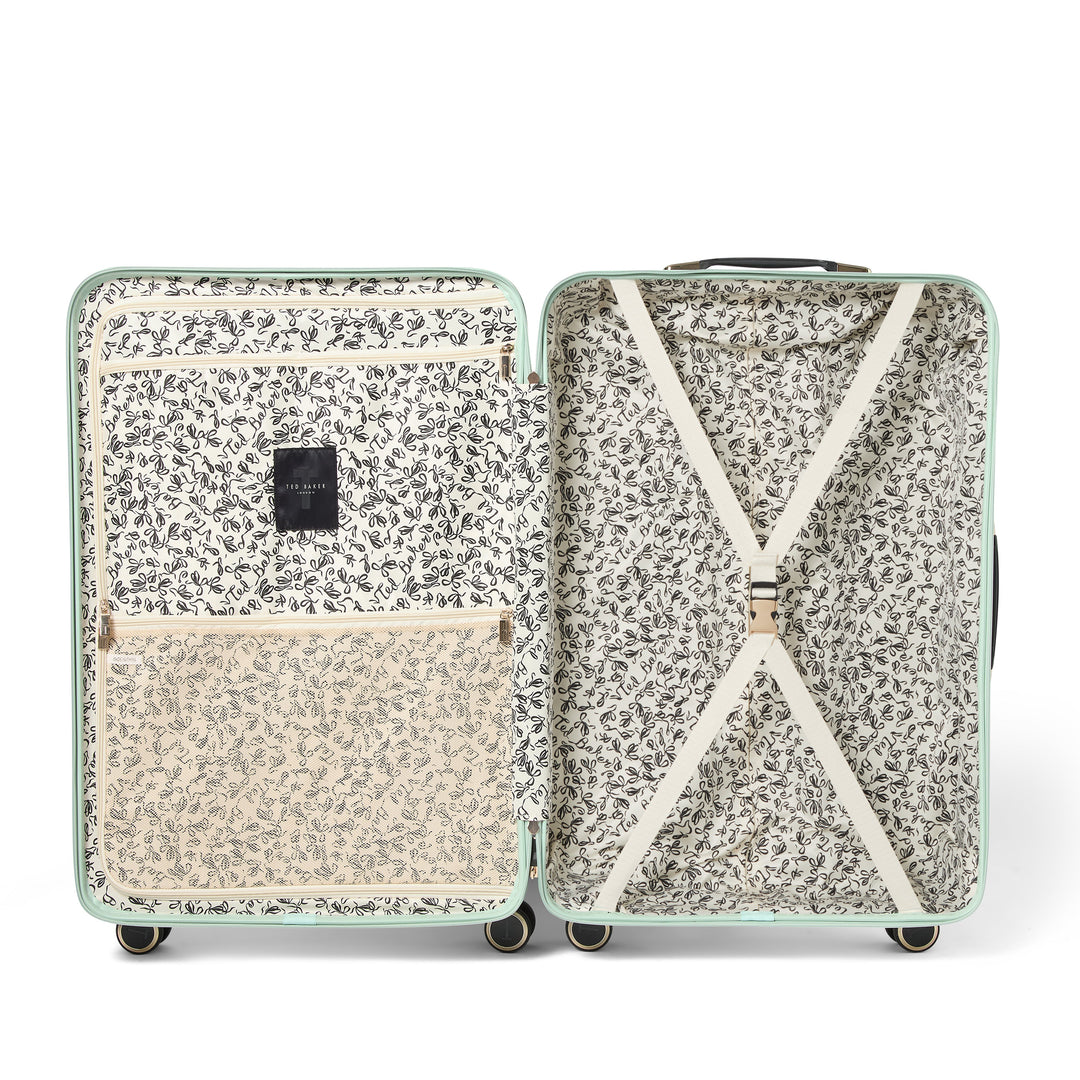 Floral-patterned suitcase interior on a white background