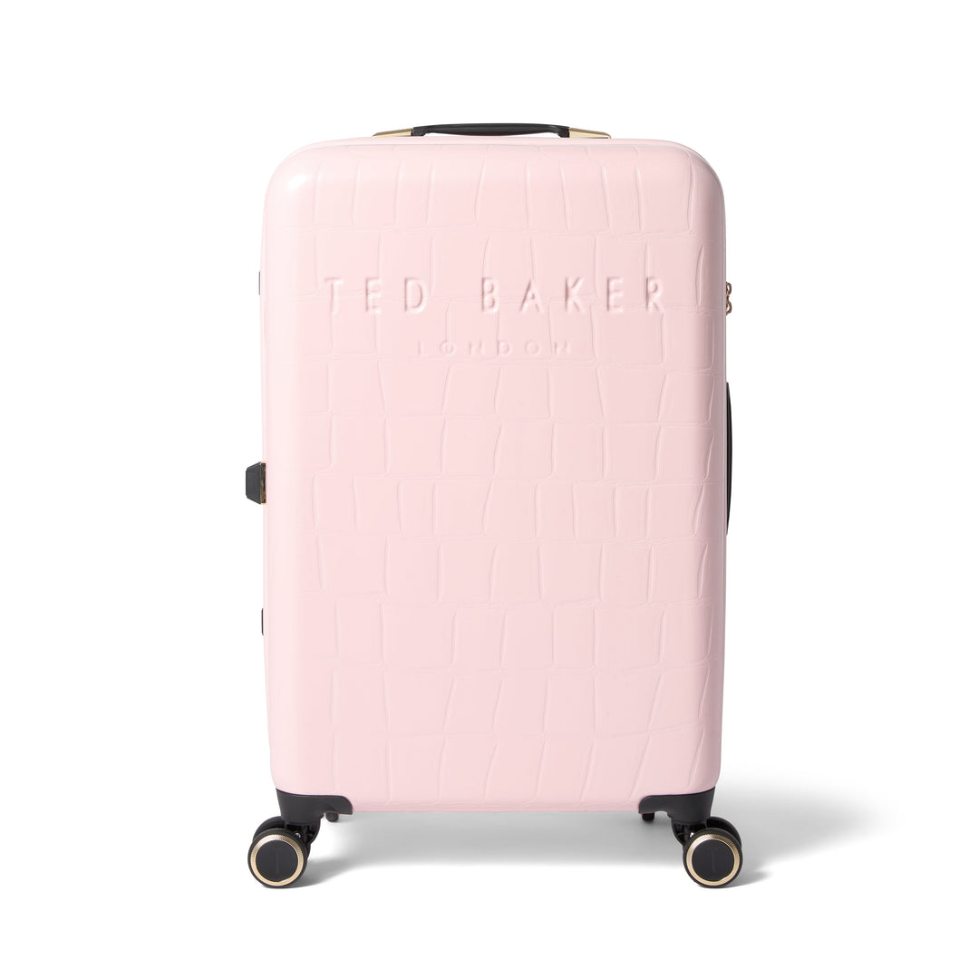 Pink suitcase with 'Ted Baker' branding on a white background