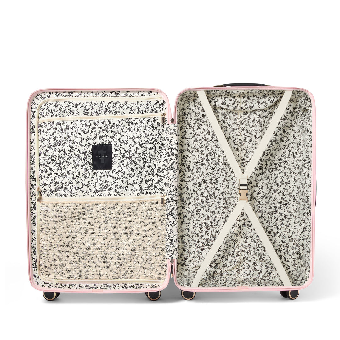 Open suitcase with floral pattern on a white background