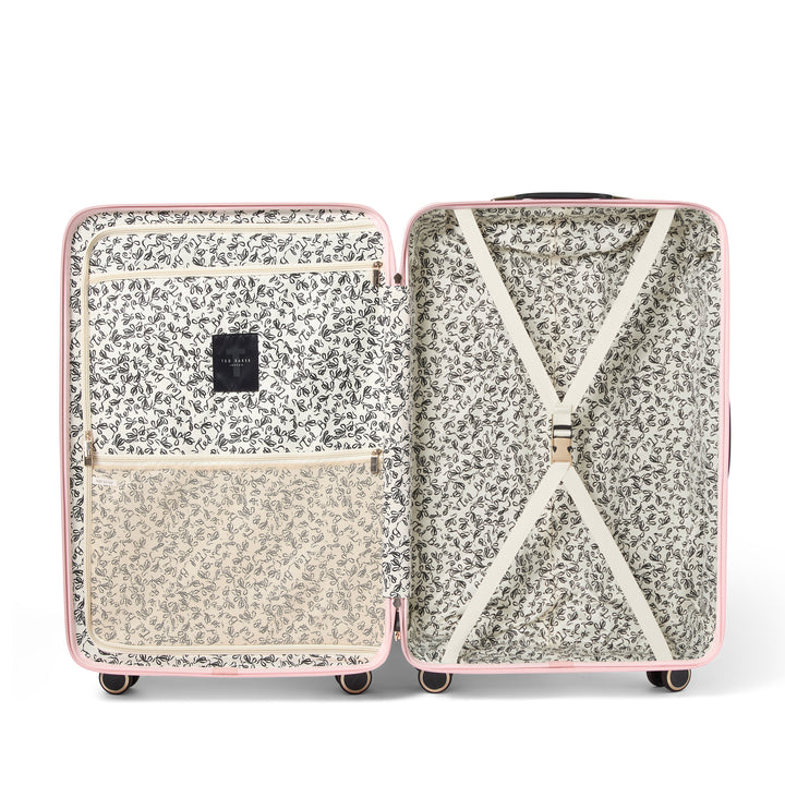 Open suitcase with floral pattern on a white background