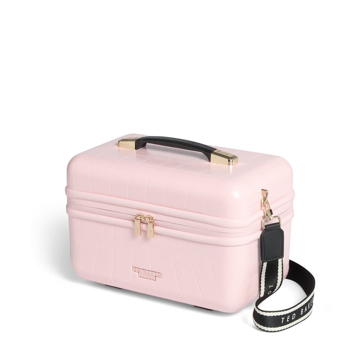 Pink makeup case with a strap on a white background