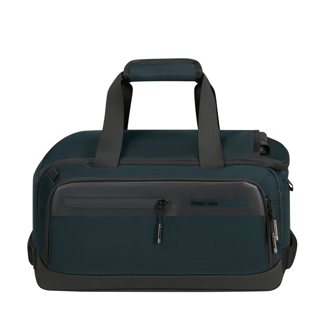 A dark teal and black duffel bag with dual top handles, a front zippered pocket, and a top carry handle, shown against a plain white background.