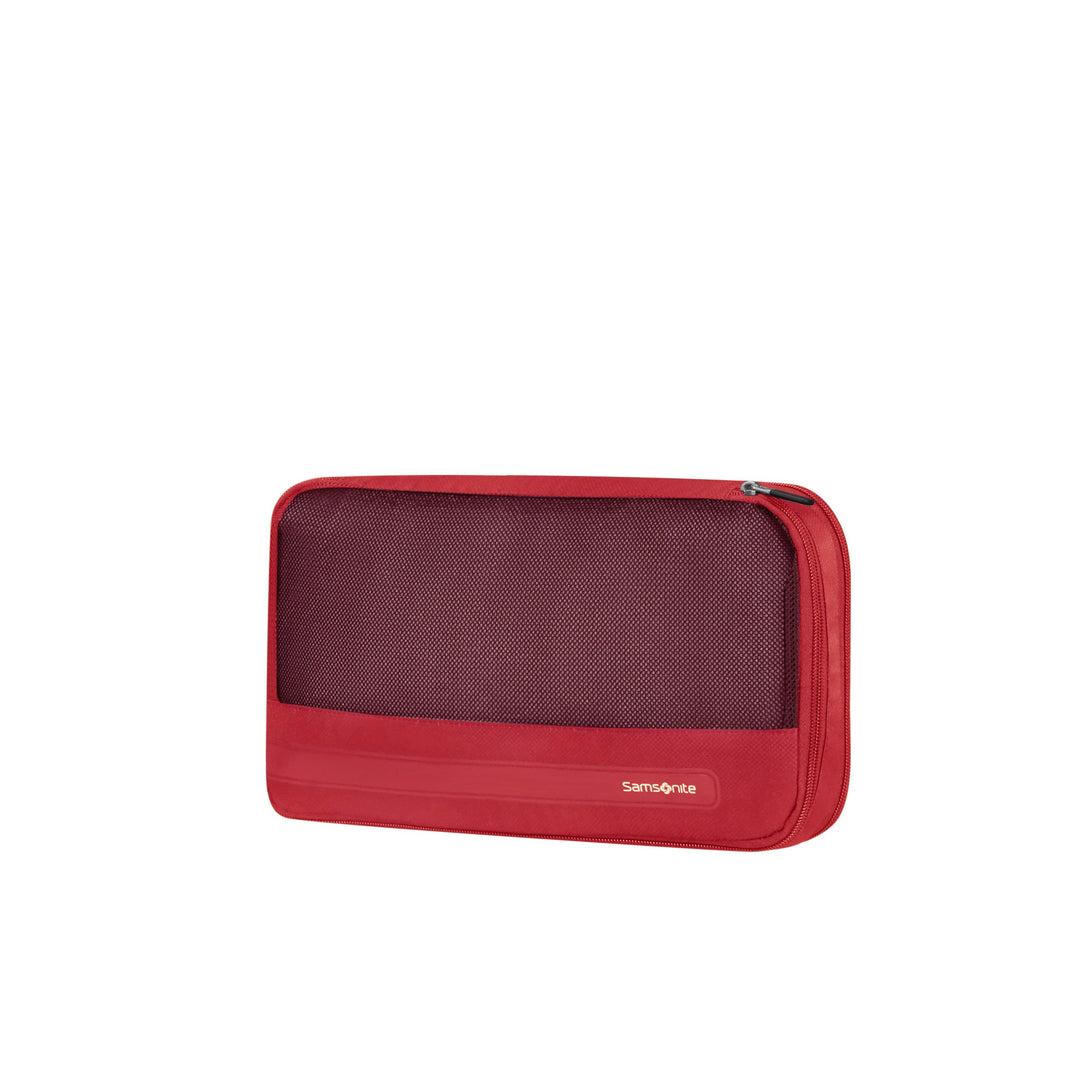 Red travel pouch with a zipper on a white background