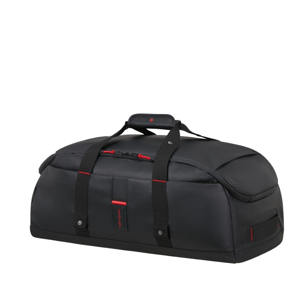 Black duffel bag with red accents on a white background