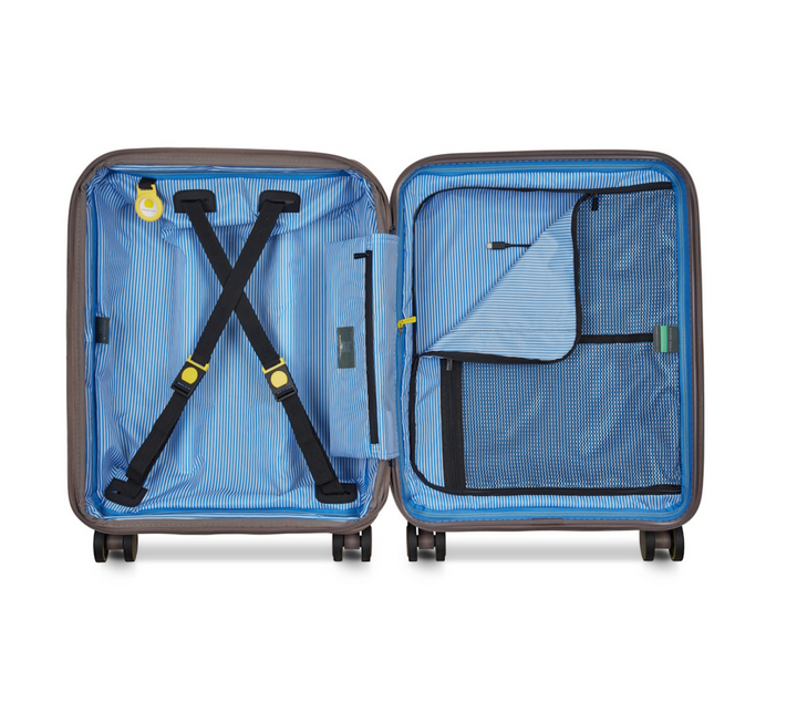 Open cabin suitcase with blue interior and black straps on a white background