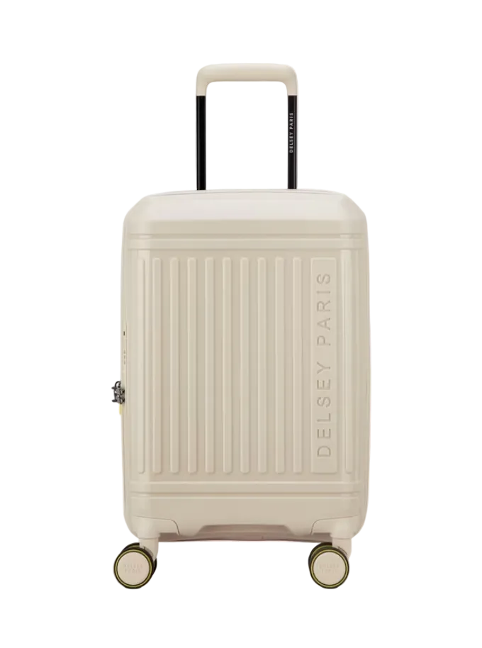 Beige suitcase with 'Delsey Paris' branding on a white background