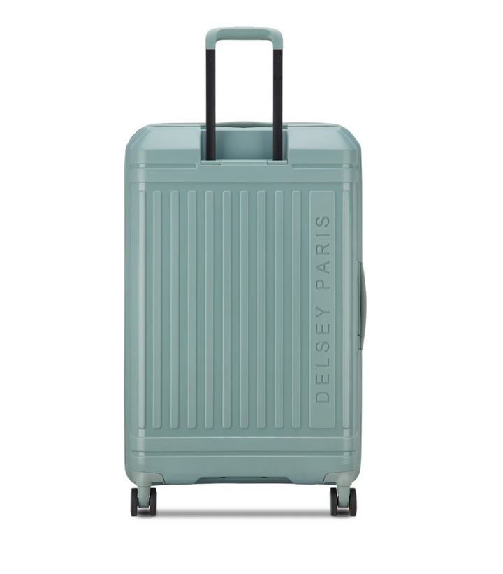 Back of a sage green suitcase with 'Delsey Paris' branding on a white background