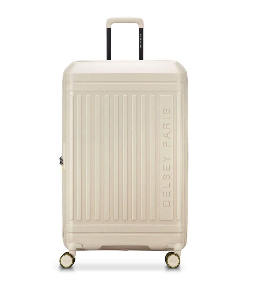 Beige suitcase with 'Delsey Paris' branding on a white background