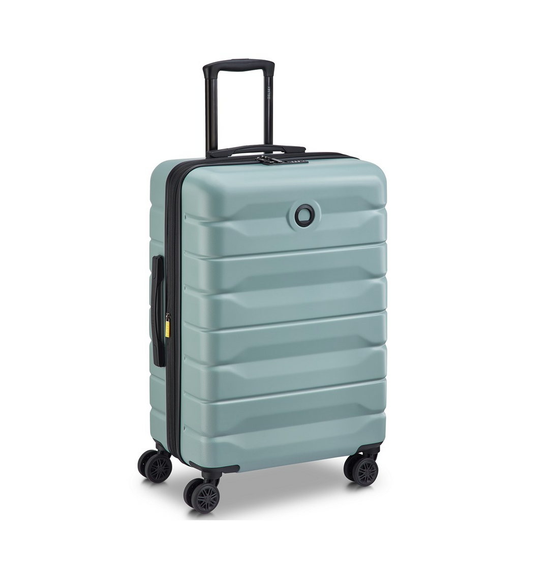 Sage Green Delsey suitcase with black wheels and handle on a white background