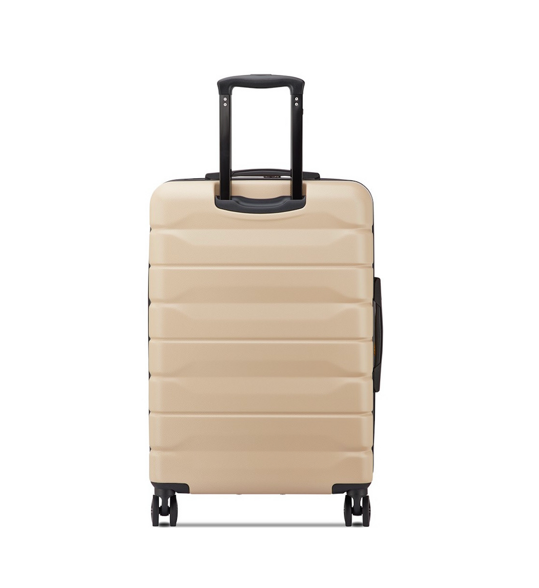 Back of a Beige Delsey suitcase with black handle and wheels on a white background