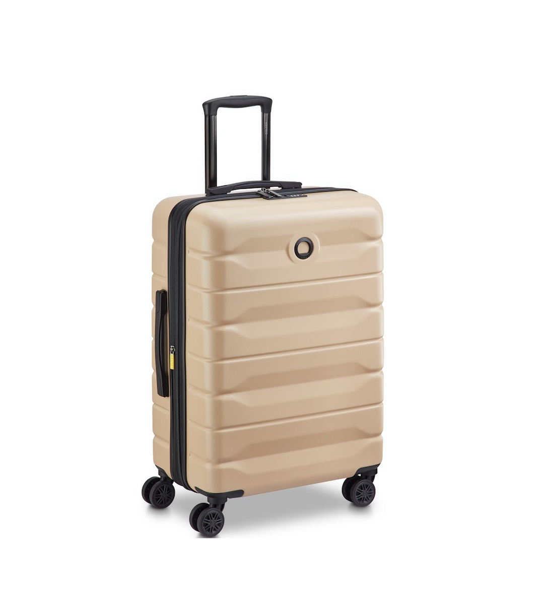 Beige Delsey suitcase with black handle and wheels on a white background