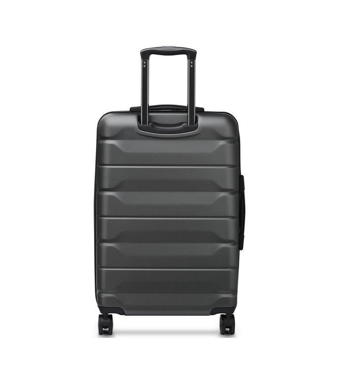 Black of a back Delsey suitcase with a textured surface on a white background